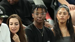 Bryce James (C), son of LeBron James #6 of Team United States, looks on during a Men's basketball semifinals match between Team United States and Team Serbia