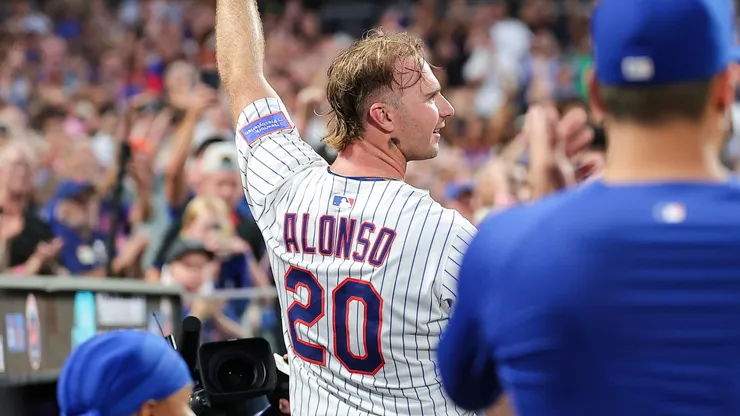 Pete Alonso #20 of the New York Mets gestures to the crowd after hitting a two-run home run.