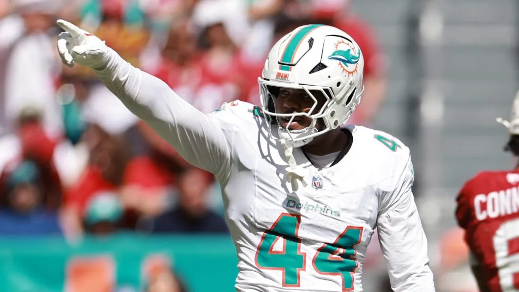 Chop Robinson #44 of the Miami Dolphins celebrates after a defensive play in the second quarter of a game against the Arizona Cardinals at Hard Rock Stadium on October 27, 2024 in Miami Gardens, Florida.