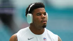 Chop Robinson #44 of the Miami Dolphins warms up prior to in a preseason game against the Washington Commanders at Hard Rock Stadium on August 17, 2024 in Miami Gardens, Florida.