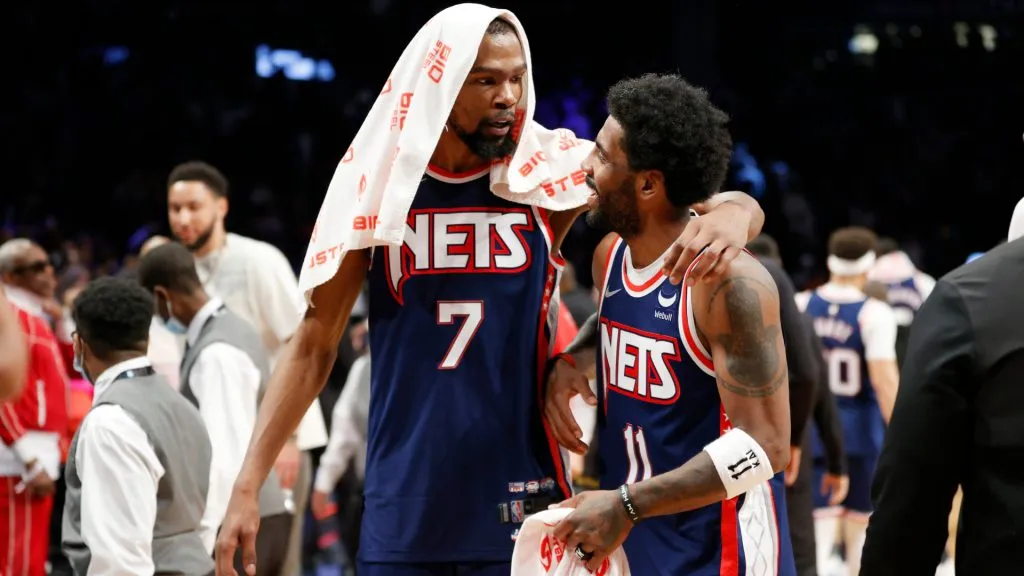 Kevin Durant #7 talks with Kyrie Irving #11 of the Brooklyn Nets after the second half against the Cleveland Cavaliers at Barclays Center. (Sarah Stier/Getty Images)
