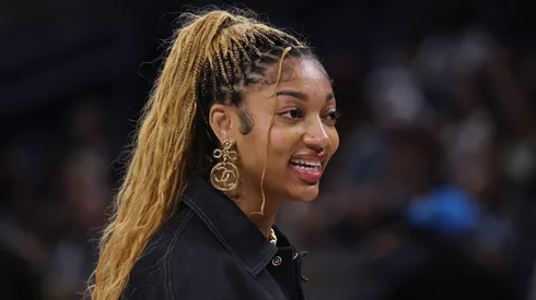 Angel Reese of Chicago Sky smiles during