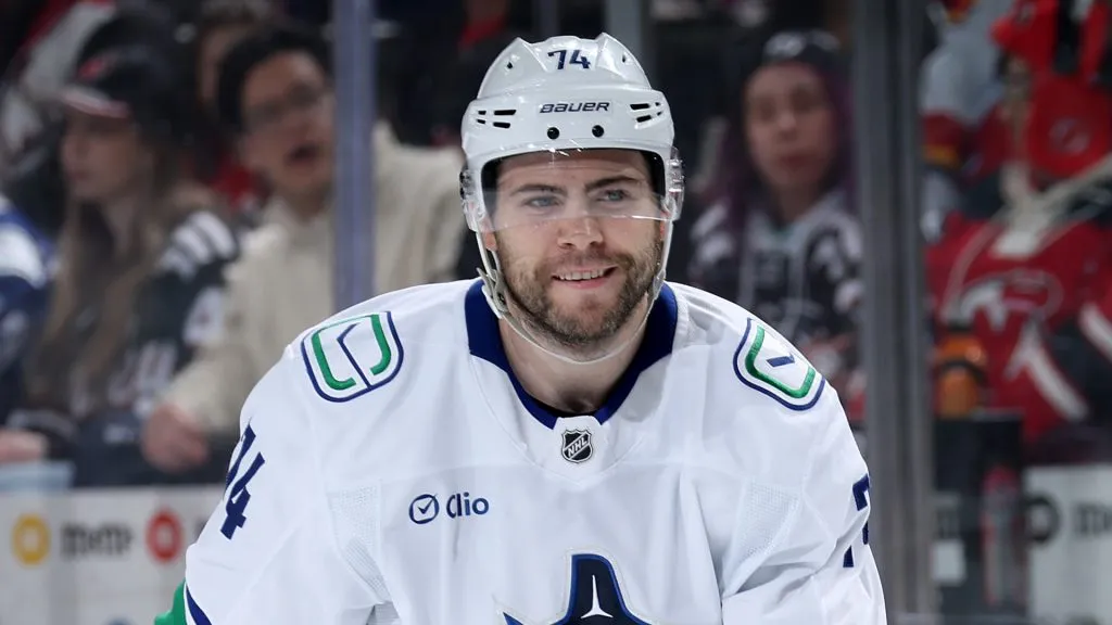 Jake DeBrusk #74 of the Vancouver Canucks reacts to teammate Pius Suter's goal during the first period against the New Jersey Devils at Prudential Center on March 24, 2025 in Newark, New Jersey.