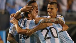 Lionel Messi #10 of Argentina is hugged by teammates including Ever Banega #19 , Nicolas Gaitan and Erik Lamela #17 after scoring a goal against Panama during the 2016 Copa America.