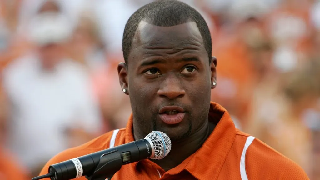 Quarterback Vince Young of the Tennessee Titans speaks after his Texas Longhorns jersey number is retired before a game against the Florida Atlantic Owls in 2007. (Source: Brian Bahr/Getty Images)
