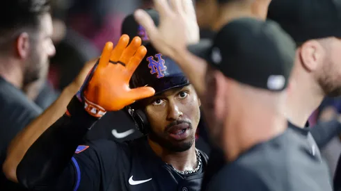 Francisco Lindor #12 of the New York Mets celebrates his third inning home run.