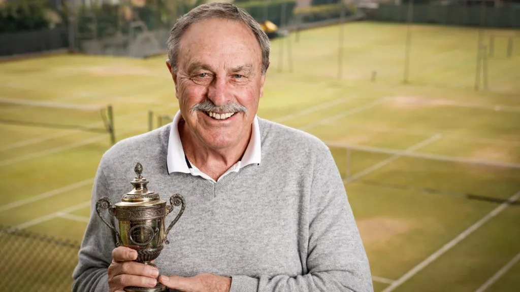 John Newcombe poses with a trophy from 1971 at the Celebrating John Newcombe’s 50th Anniversary since winning Wimbledon. (Hanna Lassen/Getty Images for Tennis Australia)
