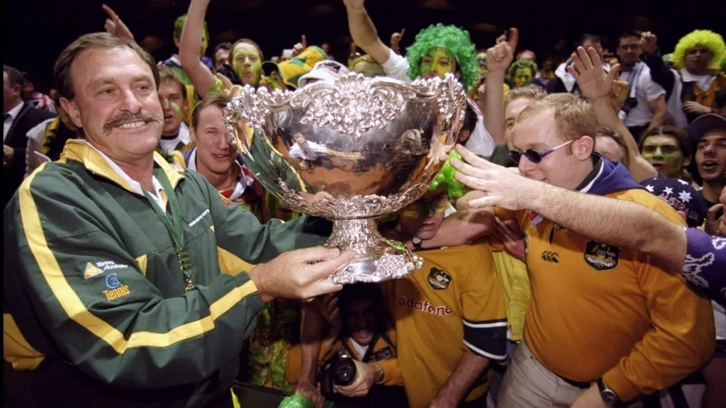 John Newcombe the Australian Captain holds the Davis Cup after Australia beat France. (Clive Brunskill /Allsport/Getty Images)