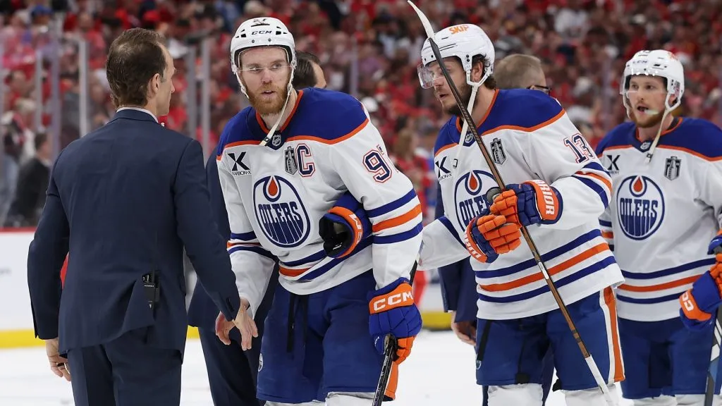 Connor McDavid #97 and Mattias Janmark #13 of the Edmonton Oilers react after being defeated in Game Six of the 2025 Stanley Cup Finals at Amerant Bank Arena on June 17, 2025 in Sunrise, Florida. The Panthers defeated the Oilers 5-1 to win the Stanley Cup Finals. (Photo by Christian Petersen/Getty Images)