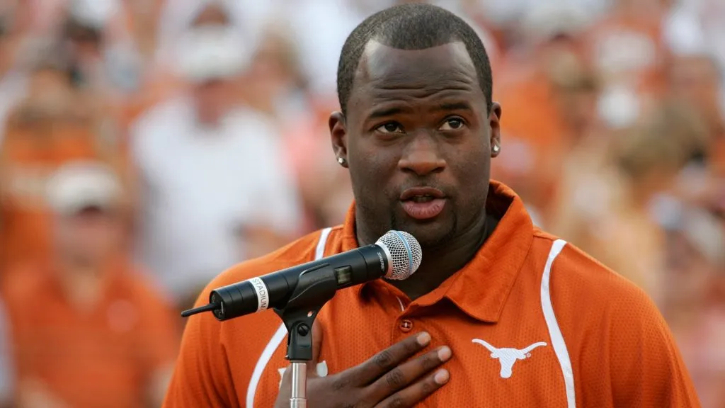 Quarterback Vince Young of the Tennessee Titans speaks after his Texas Longhorns jersey number is retired before a game against the Florida Atlantic Owls in 2007. (Source: Brian Bahr/Getty Images)