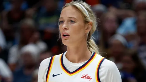 Sophie Cunningham #8 of the Indiana Fever looks on before during the game against the Dallas Wings at American Airlines Center on August 1, 2025 in Dallas, Texas.