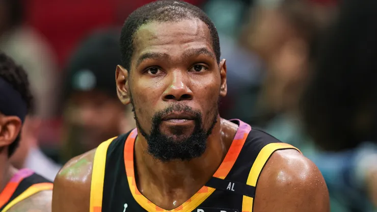 Kevin Durant #35 of the Phoenix Suns looks on from the bench.