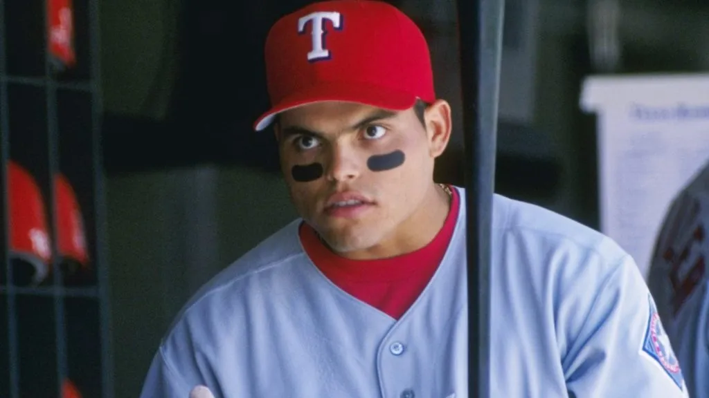 Catcher Ivan Rodriguez of the Texas Rangers picks out his bat during a game against the Cleveland Indians at Jacobs Field in 1996. (Source: Rick Stewart /Allsport)
