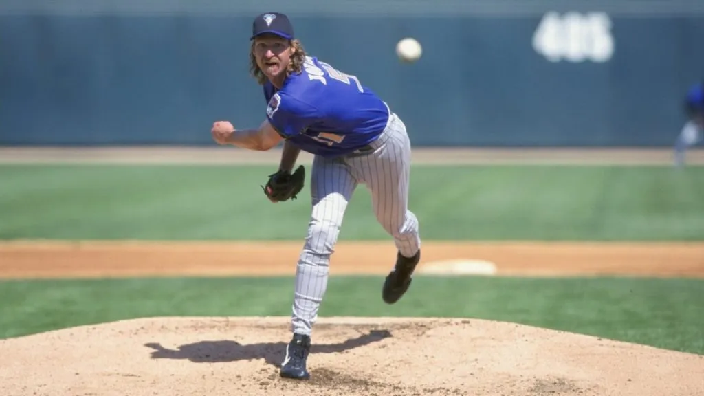 Pitcher Randy Johnson #51 of the Arizona Diamondbacks winds-up to throw during the Spring Training game against the Chicago White Sox at the Tucson Electric Park in 1999. (Source: Todd Warshaw /Allsports)
