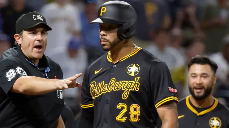 Tommy Pham #28 of the Pittsburgh Pirates looks into the dugout after flipping his bat.