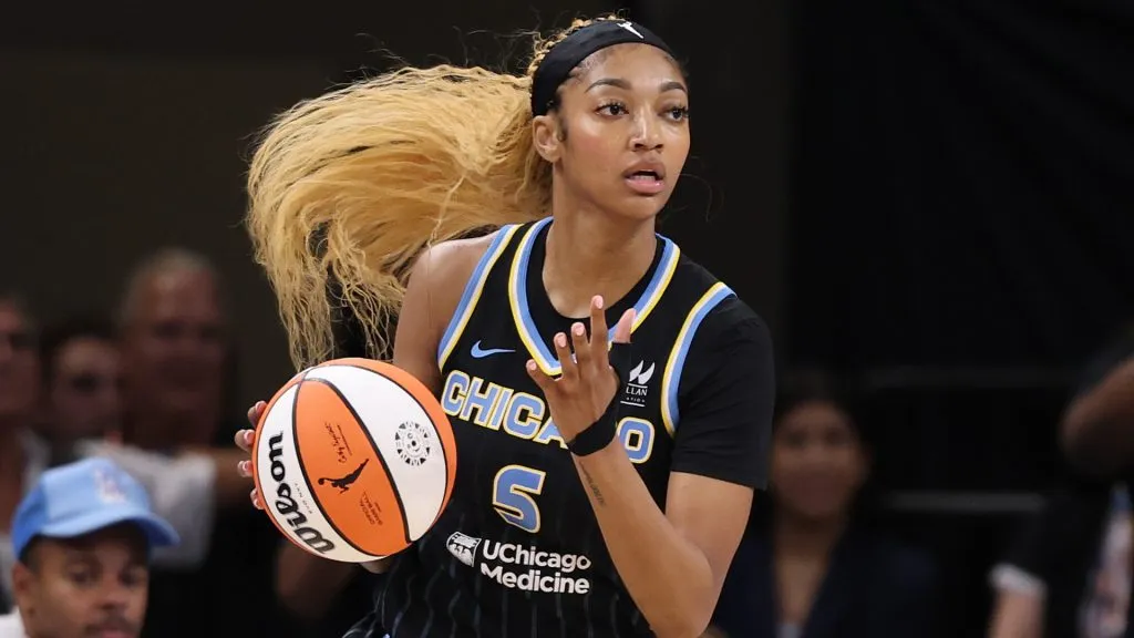 Angel Reese #5 of the Chicago Sky dribbles against the Dallas Wings at Wintrust Arena. (Michael Reaves/Getty Images)