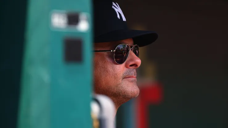 Manager Aaron Boone #17 of the New York Yankees looks on from the dugout.