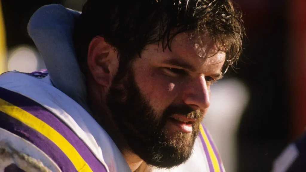 Tackle Tim Irwin #76 of the Minnesota Vikings sits on the bench during the 1988 NFC Divisional Playoffs against the San Francisco 49ers at Candlestick Park on January 1, 1989. (Source: George Rose/Getty Images)