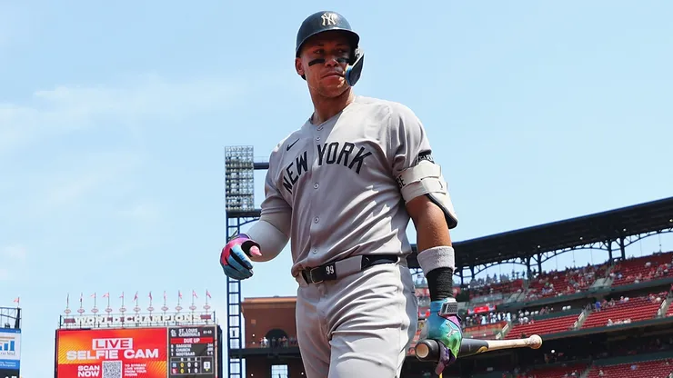 Aaron Judge #9 of the New York Yankees returns to the dugout after lining out against the St. Louis Cardinals.