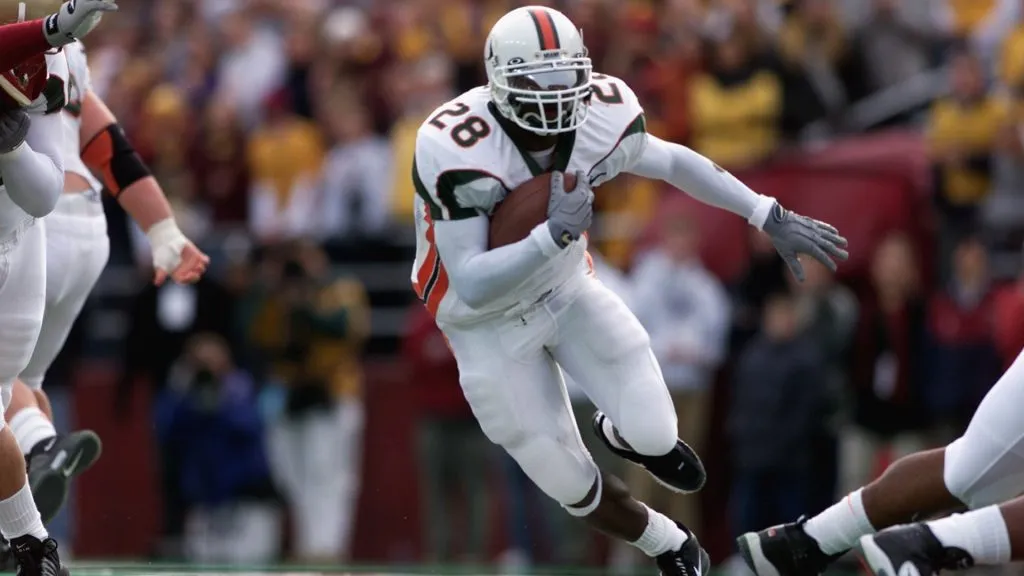 Clinton Portis #28 of the Miami Hurricanes runs with the ball against the Boston College Eagles during the game on November 10, 2001. (Source: Jamie Squire/Getty Images)