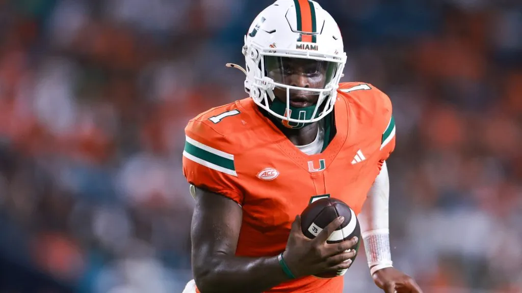 Quarterback Cam Ward #1 of the Miami Hurricanes rushes for a touchdown against the Florida A&M Rattlers during the second half at Hard Rock Stadium on September 07, 2024. (Source: Carmen Mandato/Getty Images)