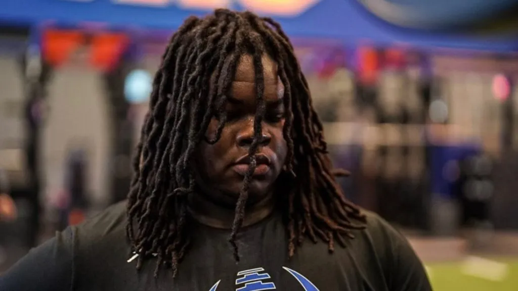 Desmond Watson looks on