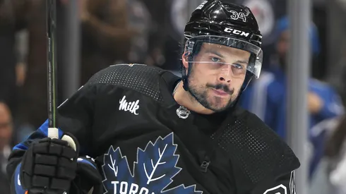 Auston Matthews leaves the ice after scoring a goal.