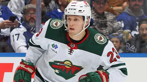 Marco Rossi of the Wild skates against the Toronto Maple Leafs.