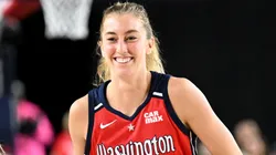 Lucy Olsen #33 of the Washington Mystics celebrates in the third quarter against the Indiana Fever at CFG Bank Arena on May 28, 2025.