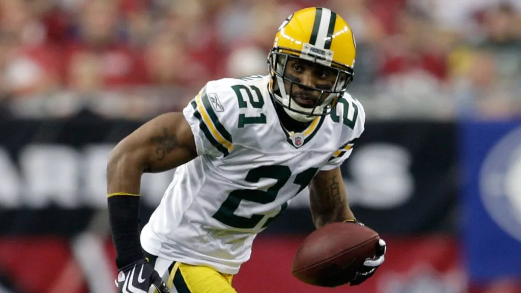 Charles Woodson runs for a 45-yard interception return for a touchdown against the Arizona Cardinals in the second quarter at University of Phoenix Stadium on January 3, 2010. (Source: Jamie Squire/Getty Images)