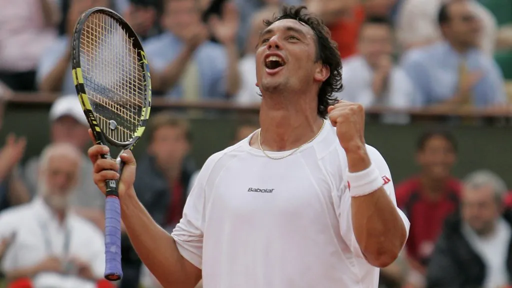 Mariano Puerta celebrates a match point against Nikolay Davydenko during the 2005 Roland Garros. (Clive Mason/Getty Images)