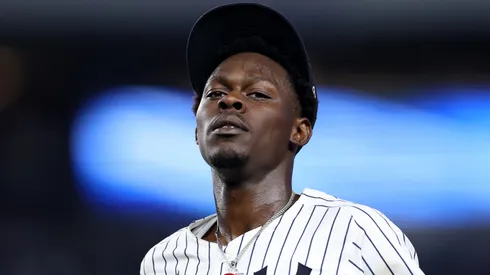 Jazz Chisholm Jr. #13 of the New York Yankees heads back to the dugout.