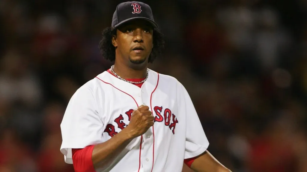 Pitcher Pedro Martinez #45 of the Boston Red Sox reacts during the game against the New York Yankees at Fenway Park on September 24, 2004. (Source: Ezra Shaw/Getty Images)