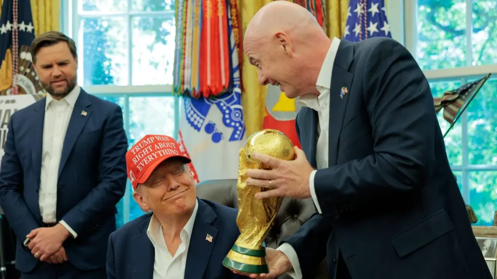 FIFA President Gianni Infantino shows U.S. President Donald Trump the World Cup Trophy in the Oval Office. (Chip Somodevilla/Getty Images)