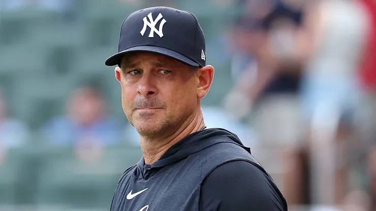 Aaron Boone steps out to the field.
