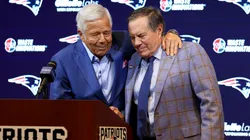 Owner Robert Kraft (L) hugs head coach Bill Belichick (R) of the New England Patriots.