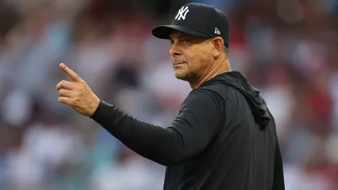 Aaron Boone points to the bullpen on July 19, 2025 in Atlanta, Georgia.