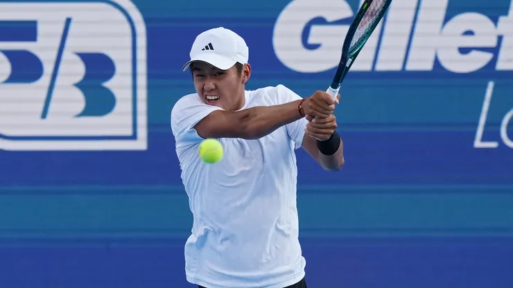 Learner Tien of the United States plays a backhand.