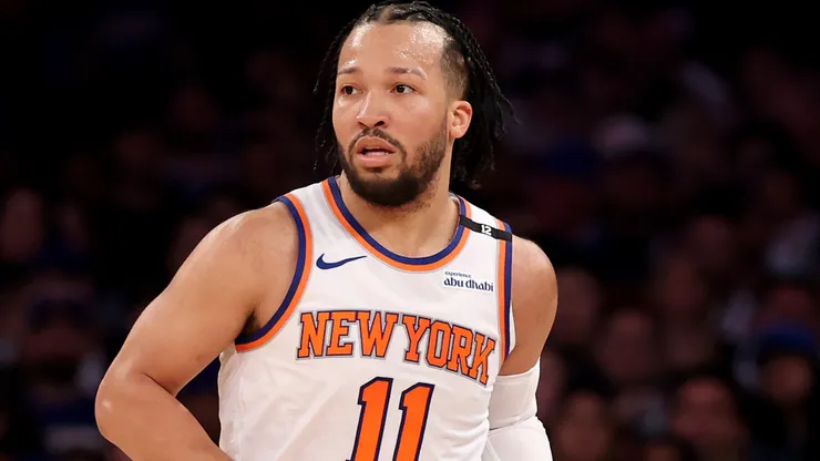 Jalen Brunson #11 of the New York Knicks dribbles against the Boston Celtics.