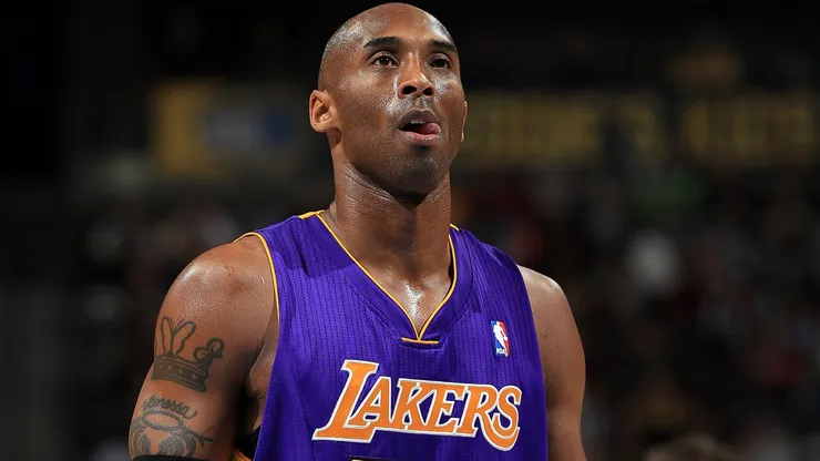 Kobe Bryant #24 of the Los Angeles Lakers takes a free throw against the Denver Nuggets.