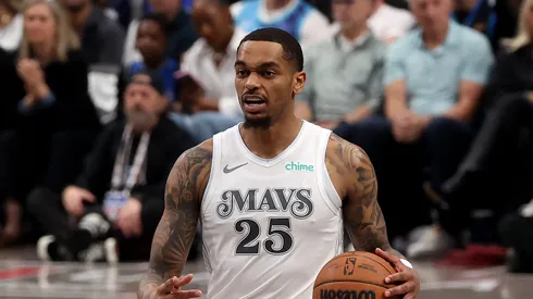 P.J. Washington #25 of the Dallas Mavericks dribbles the ball