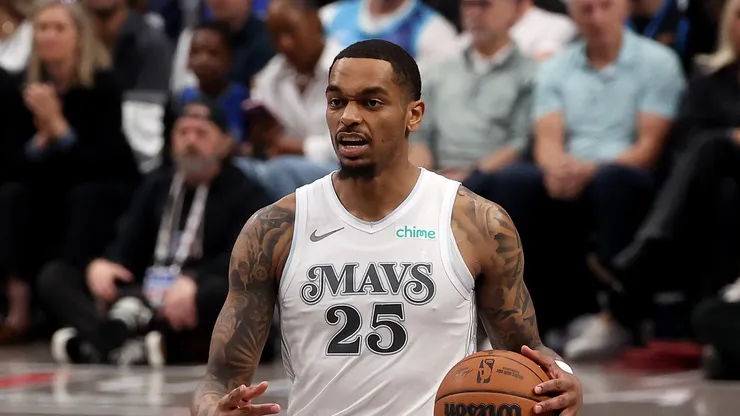 P.J. Washington #25 of the Dallas Mavericks dribbles the ball
