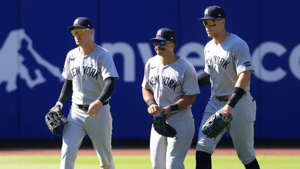 Bellinger, Grisham, and Judge celebrates after defeating the Mets on July 06, 2025.