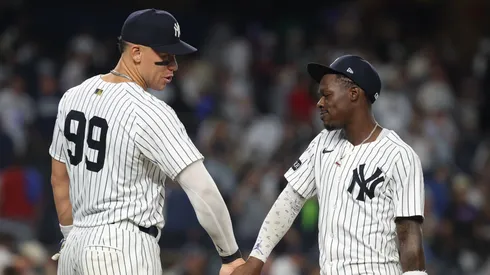 Jazz Chisholm Jr. #13 and Aaron Judge #99 of the New York Yankees celebrate.