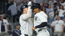 Trent Grisham #12 of the New York Yankees celebrates his solo home run with Aaron Judge #99.