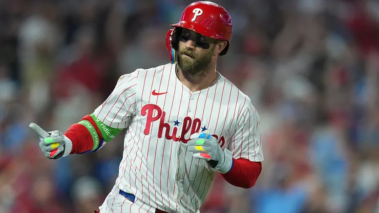 Bryce Harper #3 of the Philadelphia Phillies reacts after hitting a two-run home run.