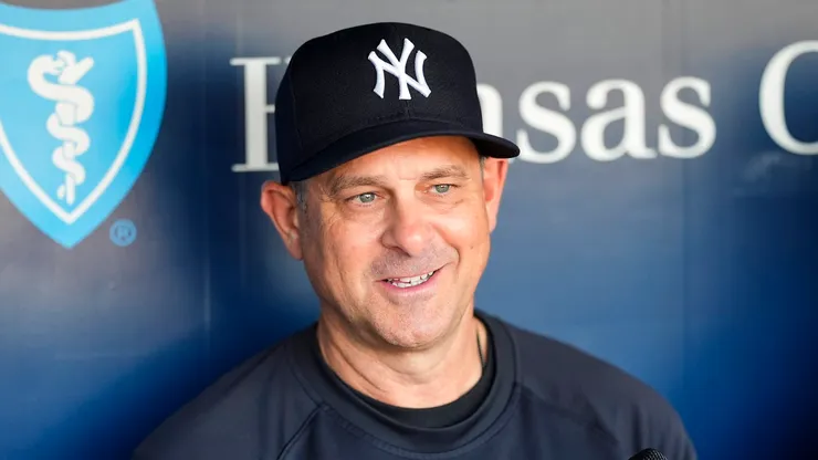 Aaron Boone talks to reporters.