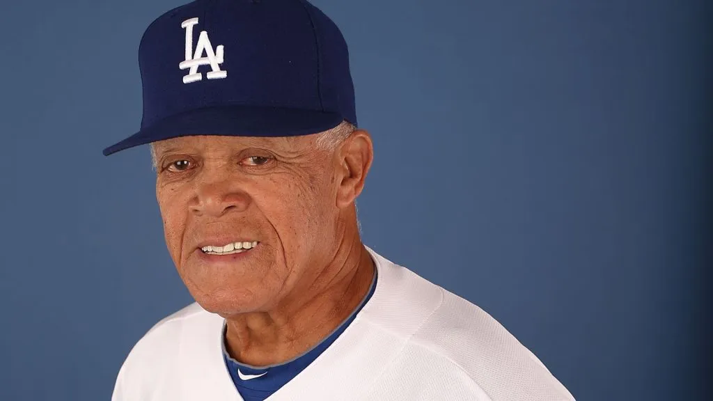 Maury Wills #30 of the Los Angeles Dodgers poses for a portrait during spring training photo day in 2013. (Source: Christian Petersen/Getty Images)