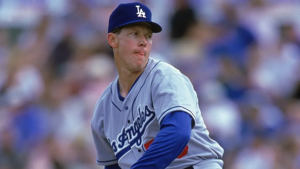 Orel Hershiser #55 of the Los Angeles Dodgers winds back to pitch the ball during the Spring Training Game in 2000. (Source: Getty Images)