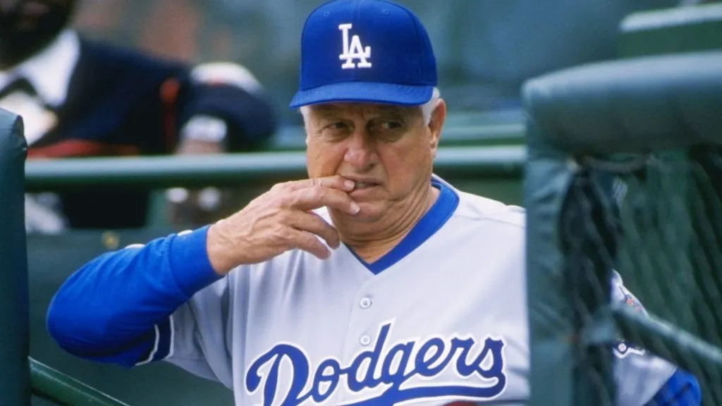 Tommy Lasorda of the Los Angeles Dodgers watches his team during a game against the San Francisco Giants in 1996. (Source: Getty Images)